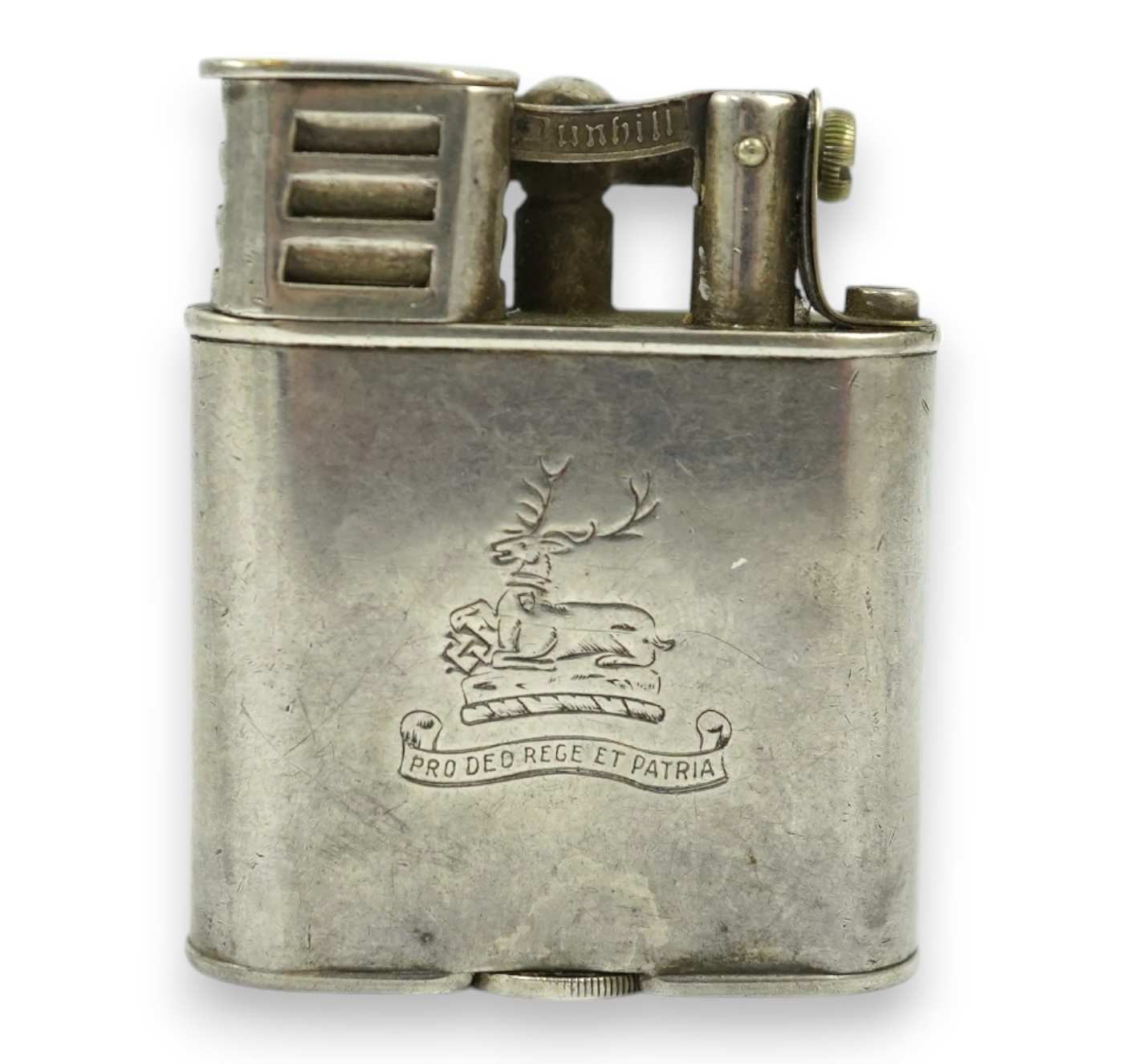 An Edwardian Dunhill cigarette lighter with unmarked crested white metal banding and patent no.288806, height 49mm. Condition - poor to fair